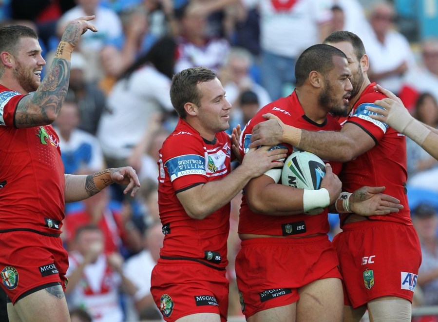 Photo by Colin Whelan copyright © nrlphotos.com :     From left Josh Dugn, Adam Quinlan, Leeson Ah Mau and Jason Nightingale celebrate try to Ah Mau                          NRL Rugby League, Round 15 Gold Coast Titans v St George Illawarra Dragons at Robina, Sunday June 22nd 2014.