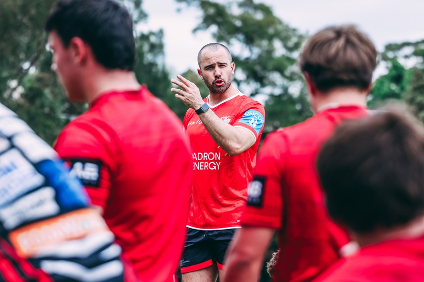 Dragons Performance / Football Operations Manager Travis Roche giving instructions.