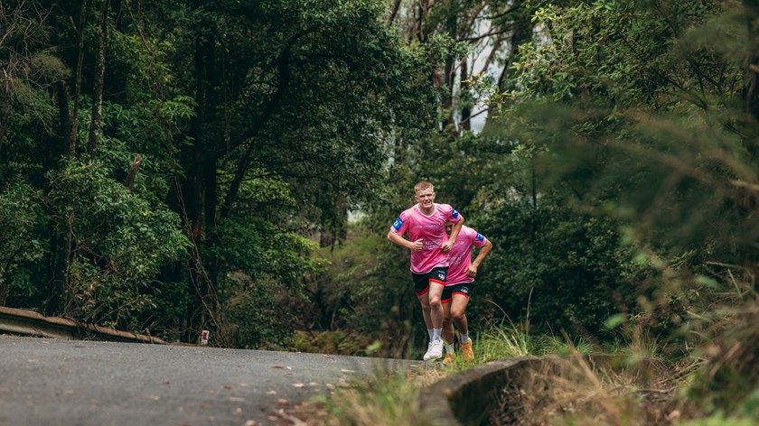 Reed putting in the hard yards as he ascends Mount Keira.