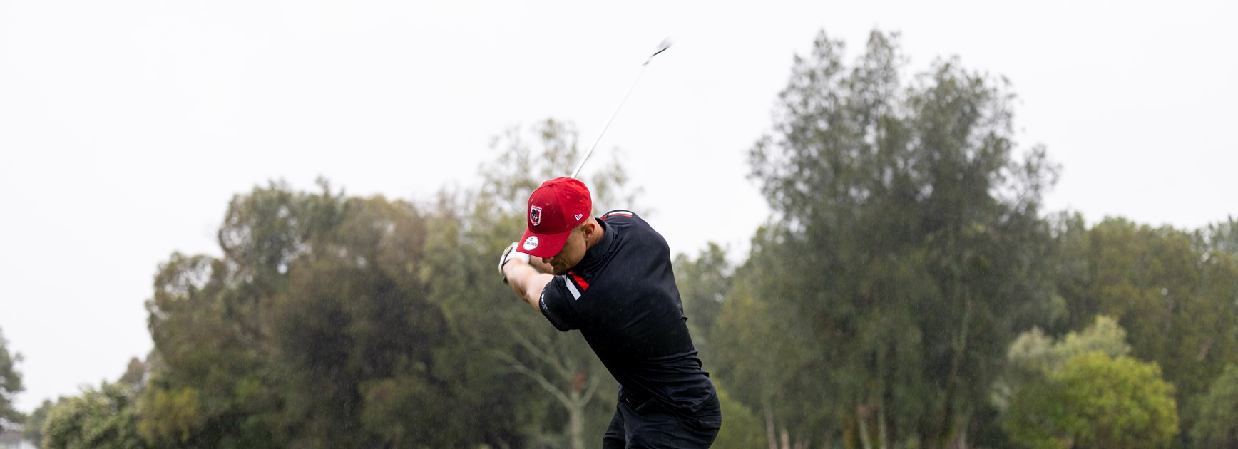 Talented golfer Zac Lomax mid-swing.