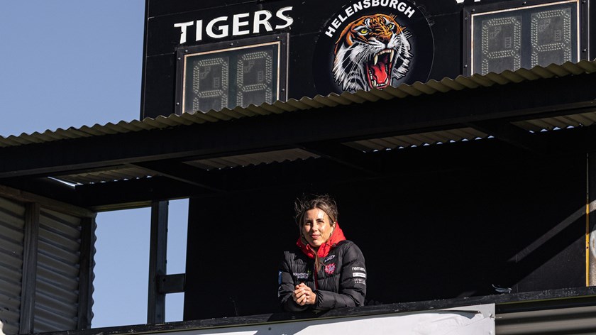 Dragons General Manager of Female Football and Helensburgh Tigers junior Sammy Bremner watches on from the scoreboard at Rex Jackson Oval.