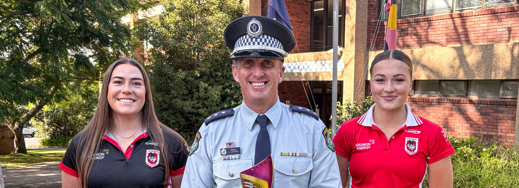 Keele Browne & Ella Koster at the DV Awareness Cup launch with Sergeant Joel Latimer.