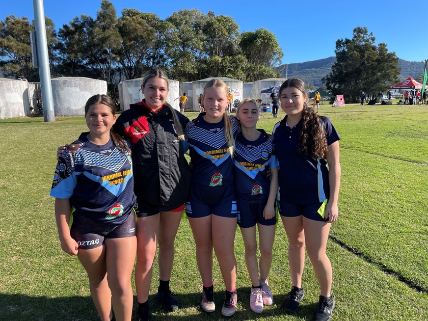 Bobbi Law posing with a group of Corrimal High School students.